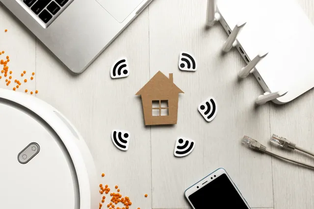 Top view wi fi router with house figurine wireless controlled devices